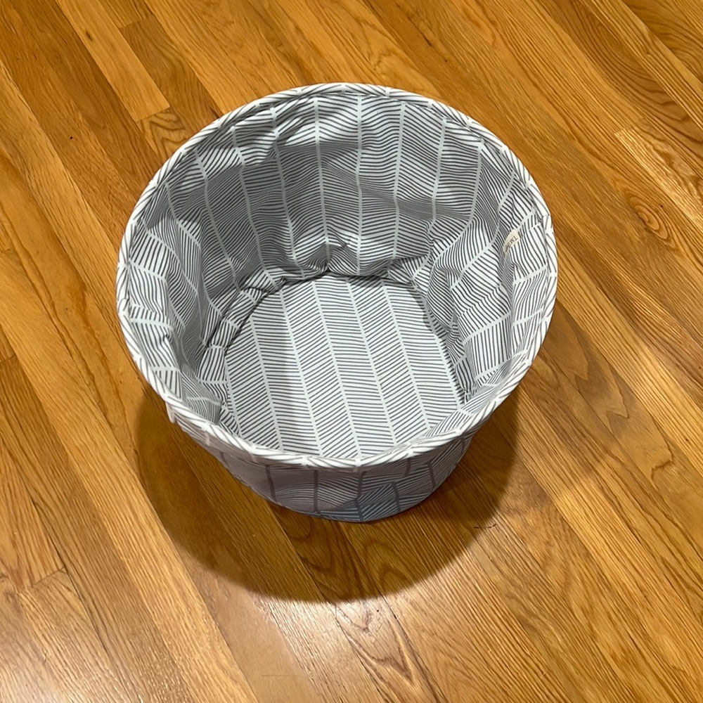 Taylor Madison Designs, oval, blue & white, storage bin, with handles.